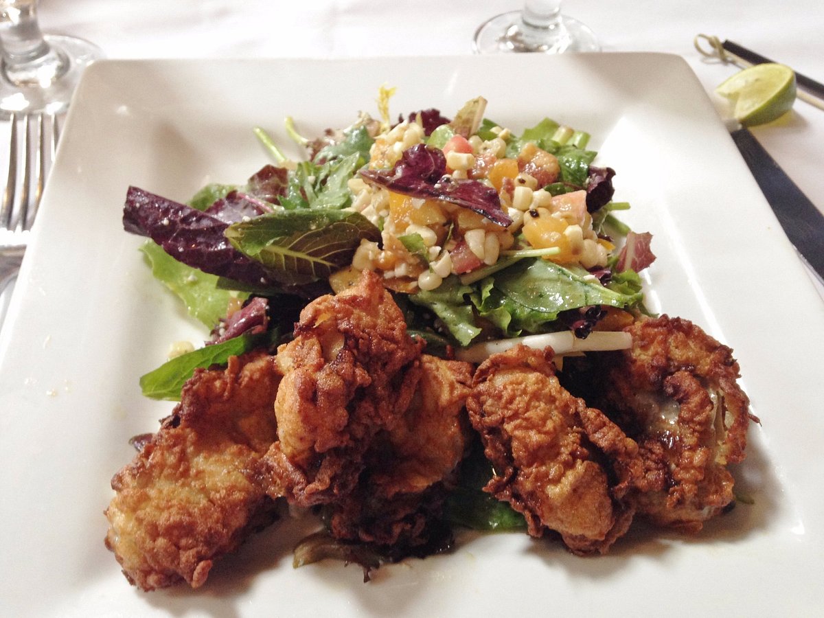 https://dynamic-media-cdn.tripadvisor.com/media/photo-o/10/11/4f/f0/fried-oyster-salad.jpg?w=1200&h=-1&s=1