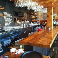 The bar at Wayfinder beer is sleek and modern