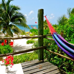 Acamaya Reef in Puerto Morelos, image may contain: Furniture, Bed, Bedroom, Room