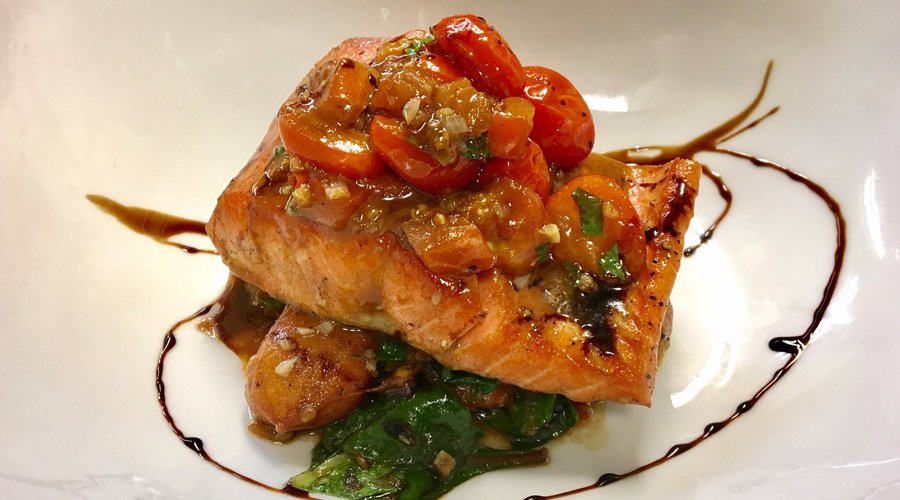 Pan seared wild sockeye salmon, house-made gnocchi, tomato and basil compote