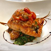Pan seared wild sockeye salmon, house-made gnocchi, tomato and basil compote