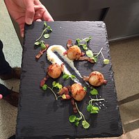 Scallop starter with cauliflower purée bacon lardons and micro watercress