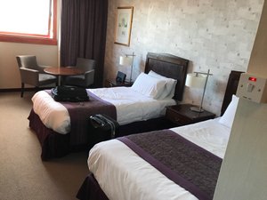 The Lerwick Hotel in Mainland, image may contain: Bed, Furniture, Chair, Handbag