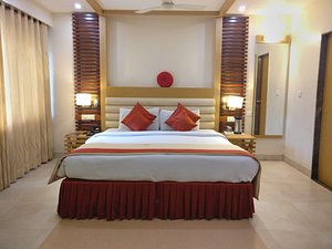 Hotel MB International in Mysuru (Mysore), image may contain: Resort, Hotel, Interior Design, Bed