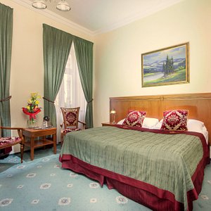 Green Garden Hotel in Prague, image may contain: Furniture, Bedroom, Indoors, Home Decor