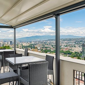 The Terrace Boutique Hotel in Tbilisi, image may contain: Scenery, Balcony, Terrace, Chair
