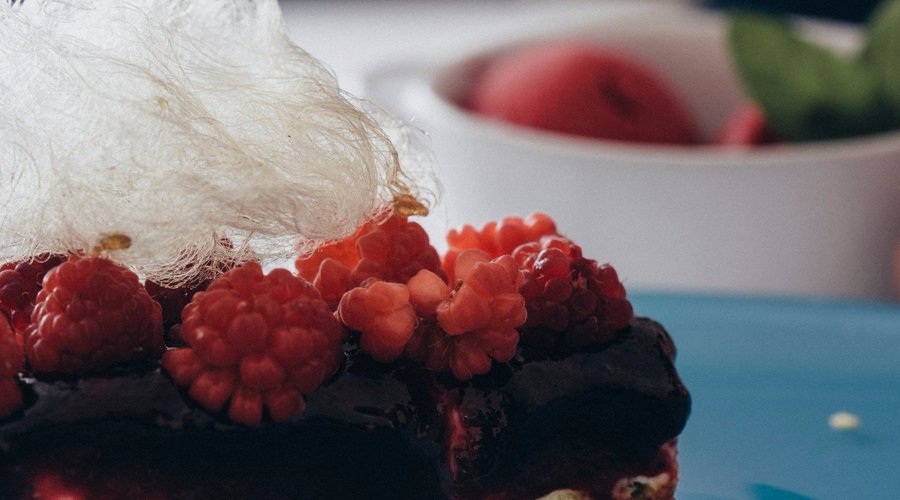 Pumpkin cake with raspberry cream and raspberry ice cream.