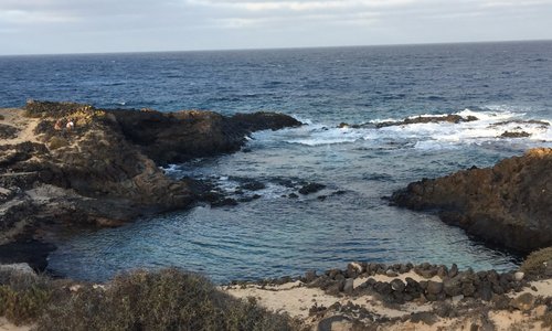 Natural tidal pool in front (high tide)
