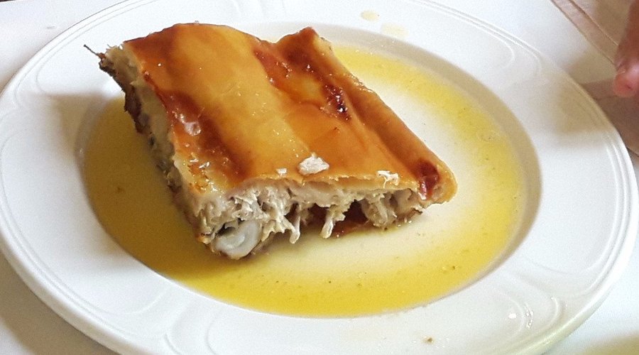 ración cochinillo menú