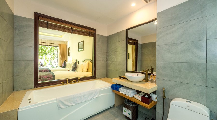 The Premier Deluxe Pool View at the Hoi An Silk Village Resort & Spa