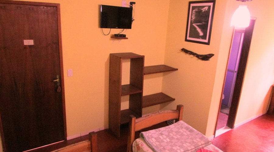 Todos os quartos equipados de TV plana 24" com canal OiTv