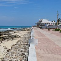 Rocky and narrow beach but a nice elevated walkway