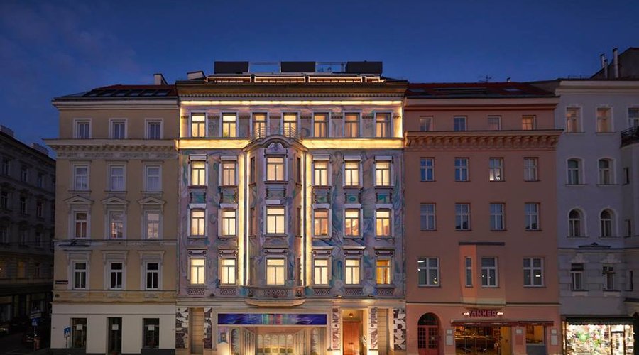 The building’s artistic facade outdoes everything in this fashionable neighborhood.