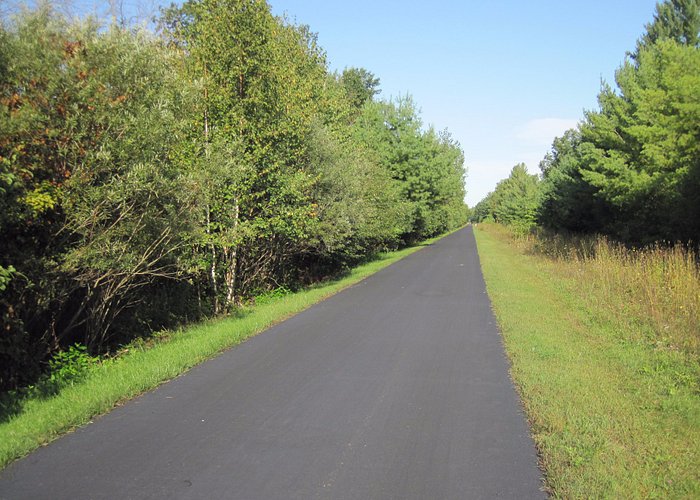 straight, wide and paved trail