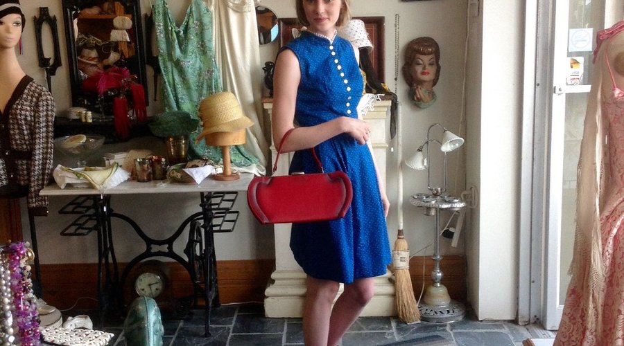 I redesign vintage clothing on site.