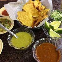 Chips, salsa, tacos and toppings. Yum!
