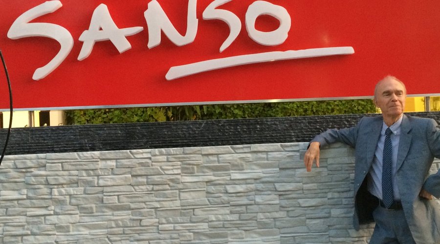 Master artist Juvenal Sansó standing in front of the museum.