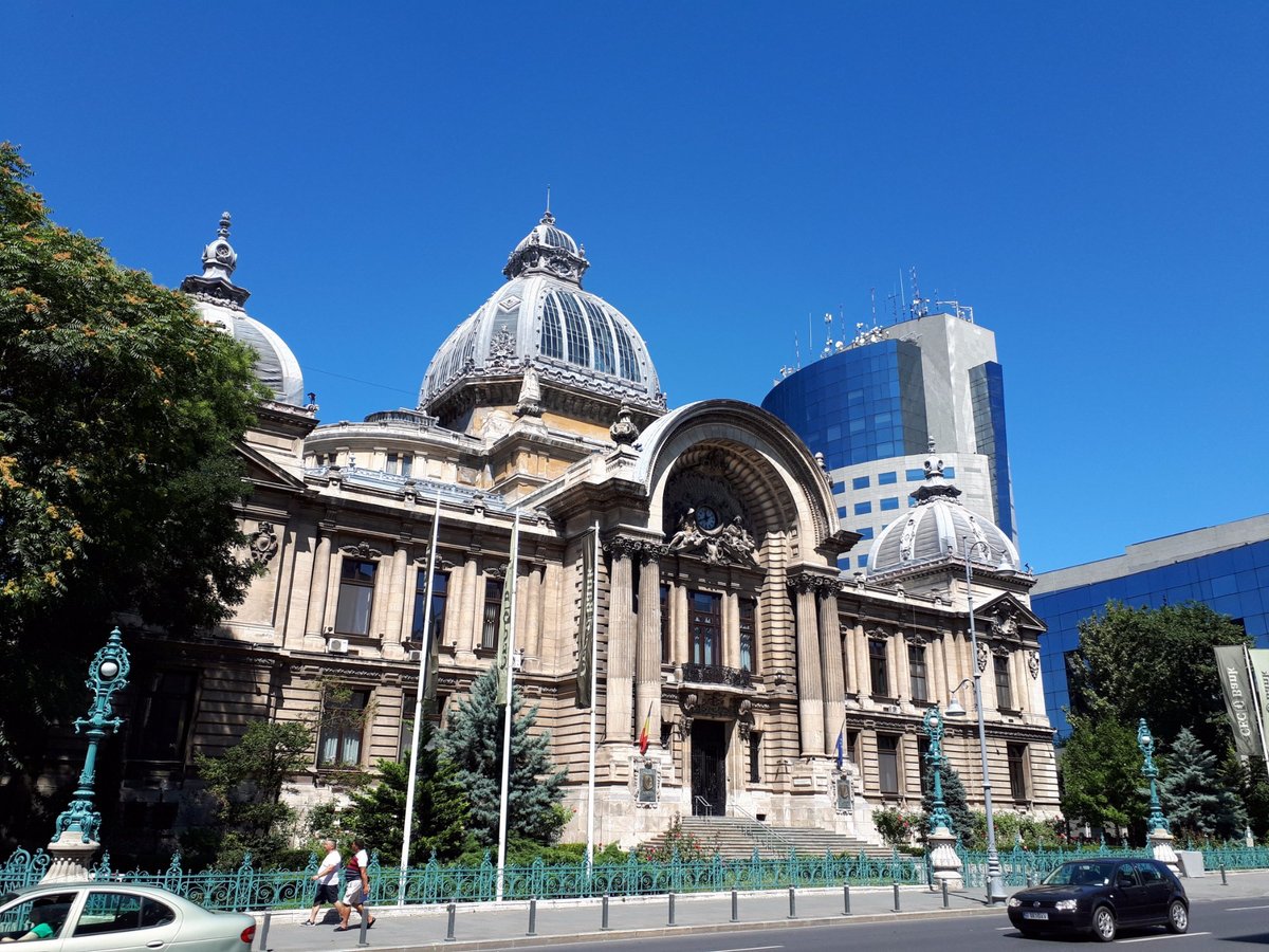 Impressive facade of Palatul CEC displaying its detailed architecture and grand entrance