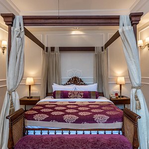 The Astor Hotel Kolkata in Kolkata (Calcutta), image may contain: Furniture, Indoors, Bedroom, Bed