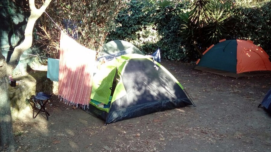 An overcrowded tent pitch