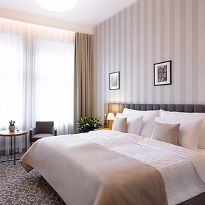 Hotel Schwaiger in Prague, image may contain: Home Decor, Lamp, Table Lamp, Interior Design