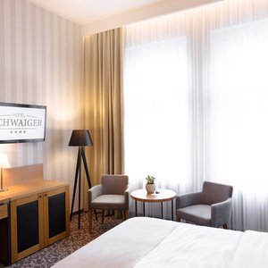 Hotel Schwaiger in Prague, image may contain: Home Decor, Lamp, Table Lamp, Interior Design