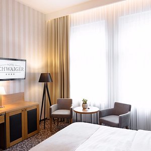 Hotel Schwaiger in Prague, image may contain: Home Decor, Lamp, Table Lamp, Interior Design