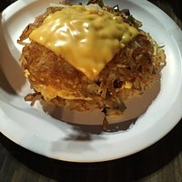 hashbrown with scrambled eggs, cheese, veggies. layered!