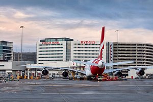 Rydges Sydney Airport Hotel in Mascot, image may contain: Airport, Airliner, Airplane, Aircraft