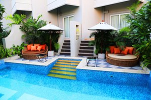 Pramod Convention & Beach Resort in Puri, image may contain: Villa, Hotel, Resort, Pool