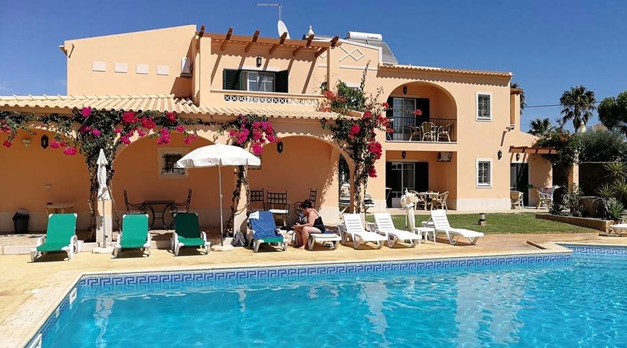 View from the garden back across the pool to the appartments
