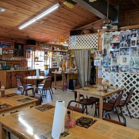 Inside dining area with tables and chairs