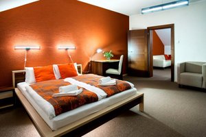 Hotel Bystricka in Martin, image may contain: Hotel, Furniture, Plant, Bed