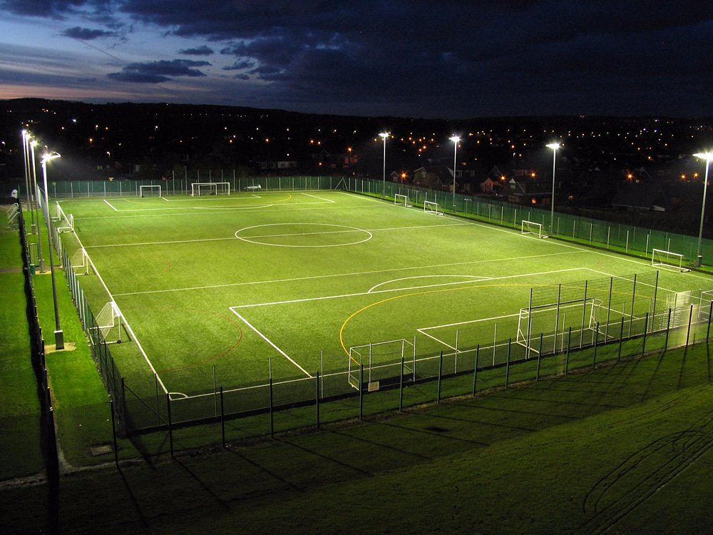 Football court. Футбольное поле в Колпино. Футбол поле. На футбольном стадионе. Футбол стадион.