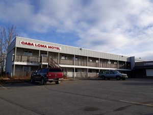 Casa Loma Motel in Whitehorse, image may contain: Office Building, Hotel, Car, Car Dealership