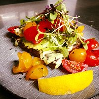 Avocado with tomato and lemon