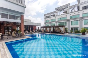 Central Park Tower Resort in Luzon, image may contain: Hotel, Resort, Pool, Villa