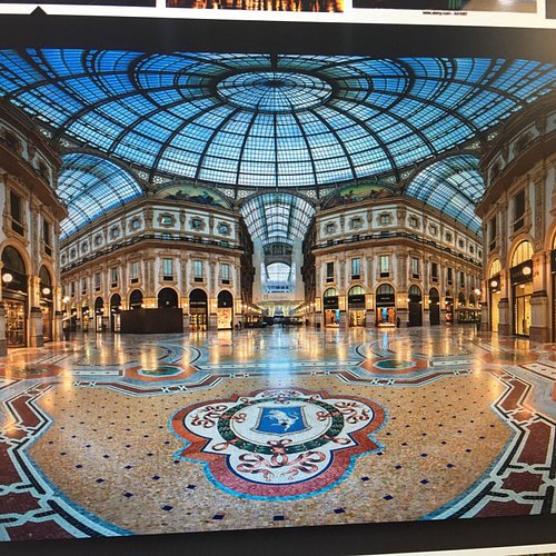 The Prada fashion store in the Galleria Vittorio Emanuele II, Milan, Italy.  The first store in the history of the luxury brand Stock Photo - Alamy
