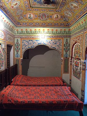 Narayan Niwas Castle in Mahansar, image may contain: Furniture, Bedroom, Bed, Indoors