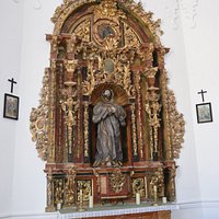 Retablo lateral con la imagen de San Francisco de Asís. Andrés Hernando. Siglo XVIII.