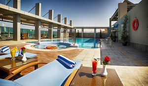 Rose Park Hotel Al Barsha in Dubai, image may contain: Villa, Pool, Hotel, Resort