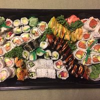 combination platter for 3-4 people, adjusted to add cucumber and avocado rolls