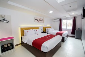 Il Mare Sakura Resort Boracay in Panay Island, image may contain: Corner, Bed, Furniture, Monitor