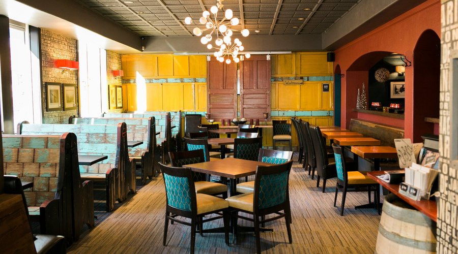 The dining room at Globe is full of eclectic colour!