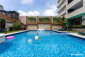 Queens Hotel Angeles City in Luzon, image may contain: Villa, Hotel, Resort, Pool