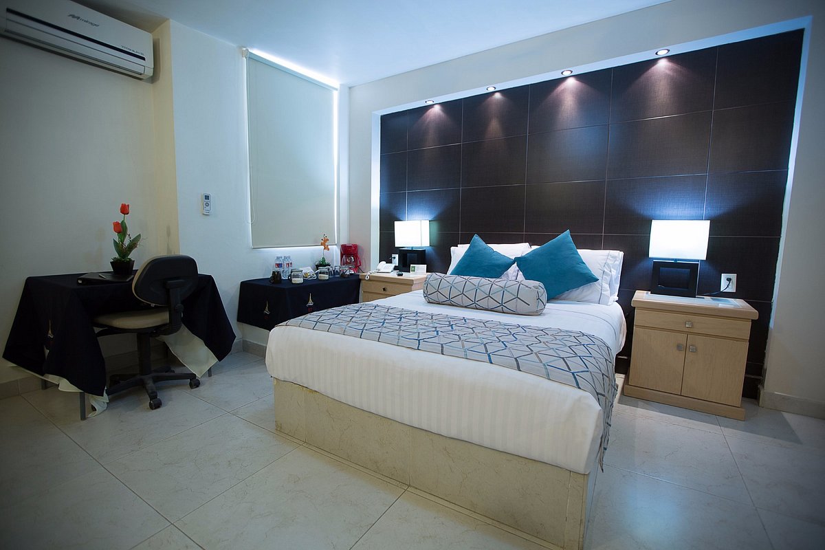 Habitaciòn dos camas matrimoniales comunica con habitacion con cama queen  size hasta para 6 pers - Picture of Hotel La Torre San Francisco, San  Francisco del Rincon - Tripadvisor