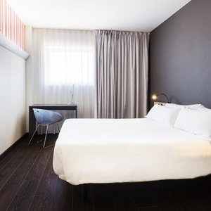 B&B HOTEL Granada in Granada, image may contain: Furniture, Bed