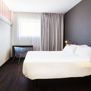 B&B HOTEL Granada in Granada, image may contain: Furniture, Bed