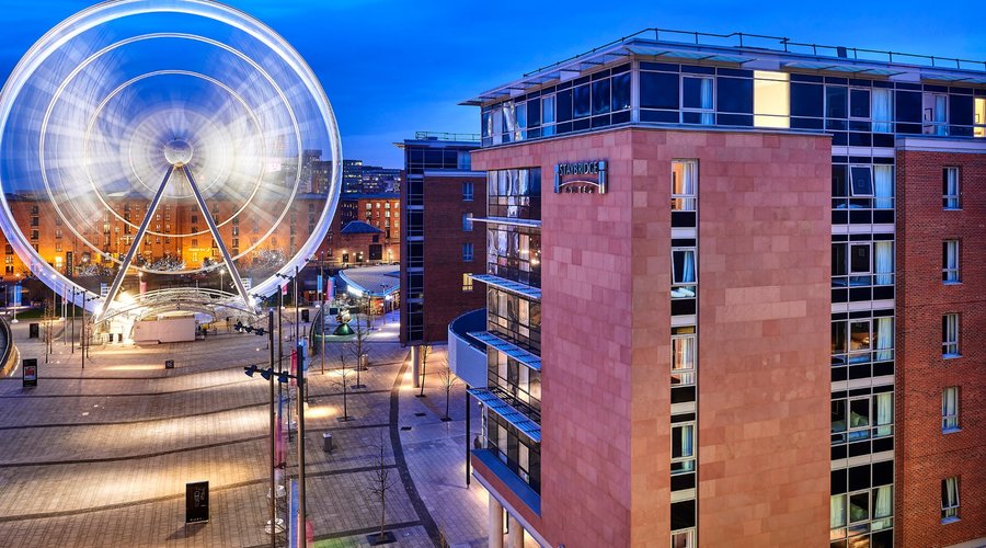 Staybridge Suites Liverpool Exterior with Liverpool Wheel 