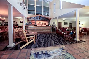 Yellowstone Pioneer Lodge in Livingston, image may contain: Flooring, Floor, Hotel, Couch